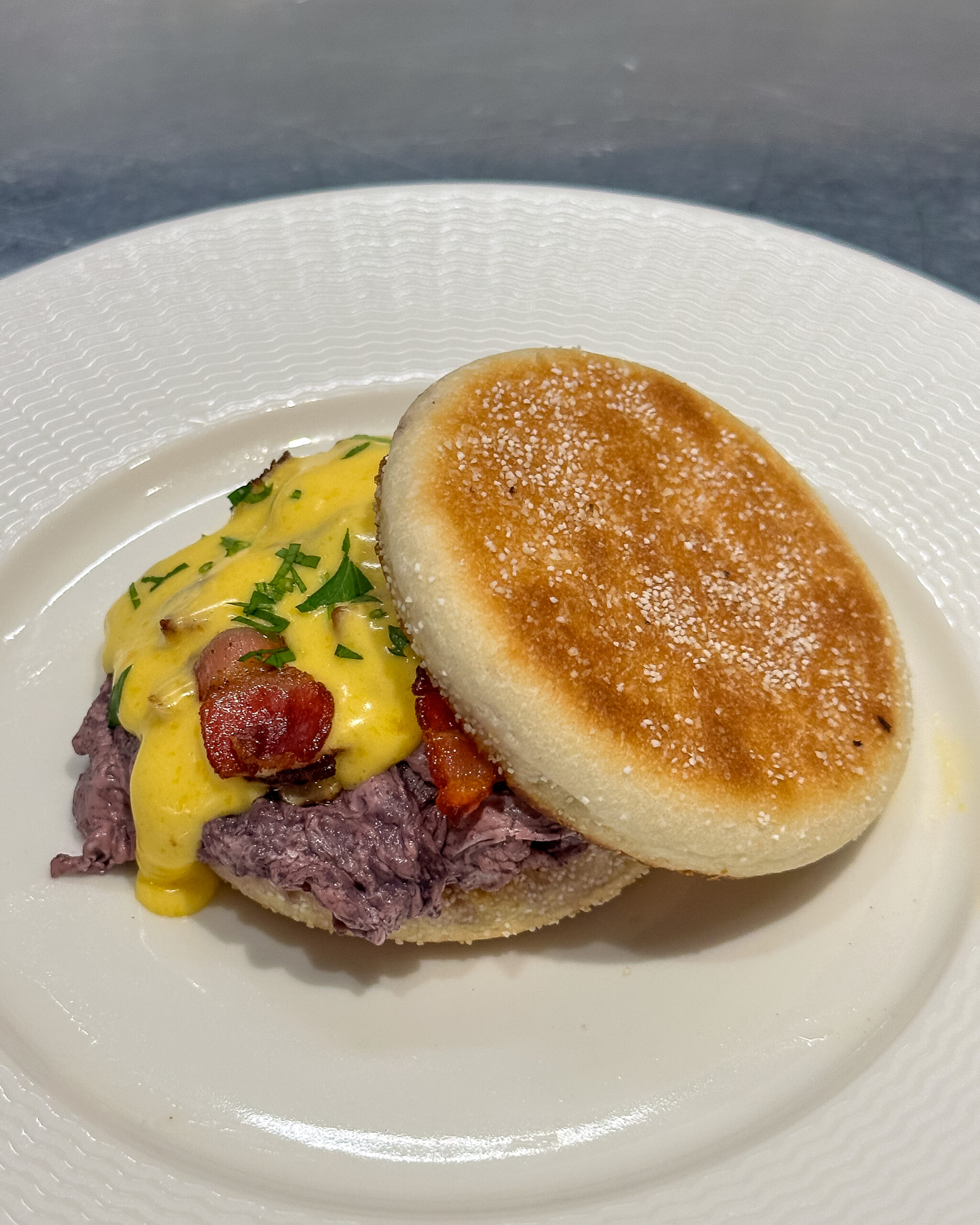 Red Wine Poached Egg Muffin with Hollandaise: A Bold Twist on Brunch Classics