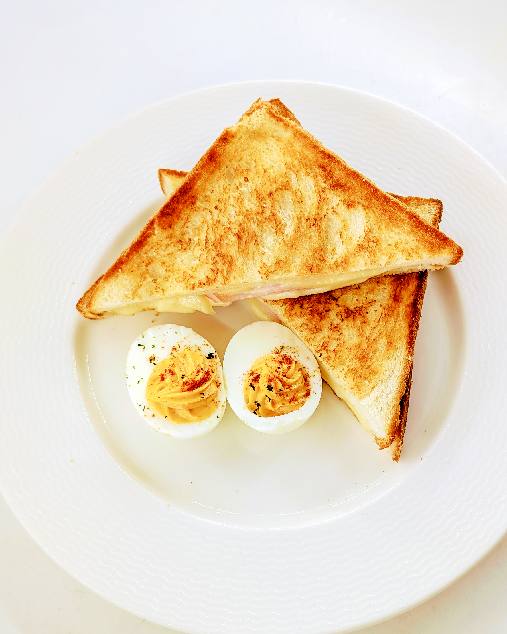 The Ultimate Comfort Duo: Grilled Ham & Cheese with Classic Deviled Eggs