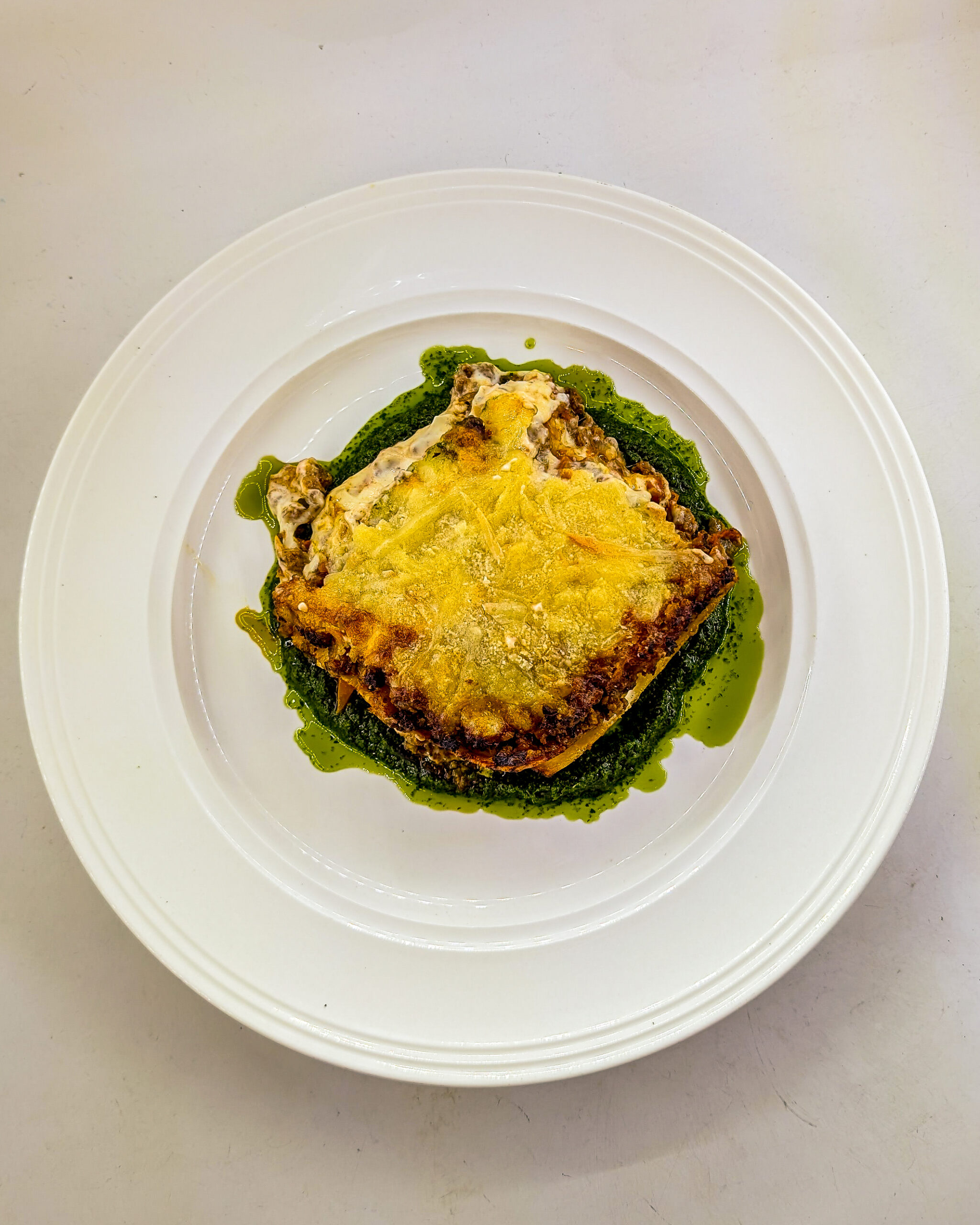 A Comforting Classic: The Story Behind Beef Lasagna with Basil Pesto